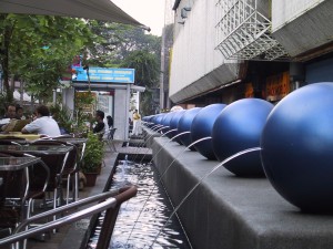I have no photos of that restaurant or that meal, so here's a picture of pissing balls at Cuppage Terrace (near our apartment).